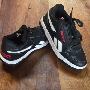 Reebok Black Heelys with White Stripes